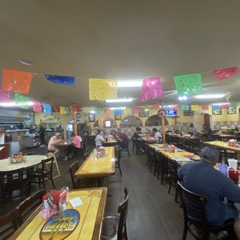 Families at the long tables of the real Vallarta dining room