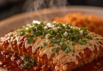 Cheese-topped enchiladas with rice